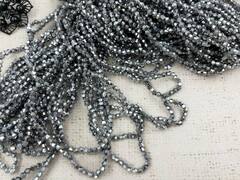Бусины граненые Биконус стекло на леске, р. 4х4 мм, отверстие 1 мм, ~83 бусины*10 нитей, черненое серебро