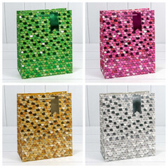 
          Пакет подарочный 26 х 32 х 13 см Набор 4 шт "Кружочки" с тиснением (Микс)