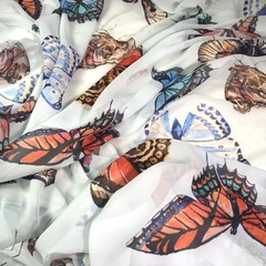 Ткань  шелк  шифон голубой с бабочками большими 1127