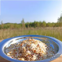 Рис с овощами НТВ 'Organic food' в сухом виде в тарелке