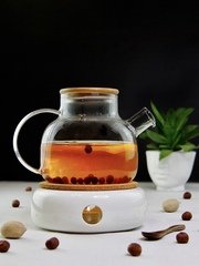 Заварочный чайник с подогревом от свечи на керамической подставке