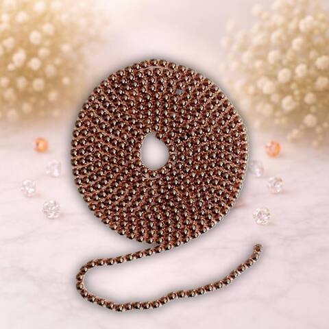 стразовая лента с черной  жемчуженой на золотом метале,1метр