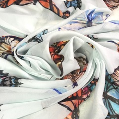 Ткань  шелк  шифон голубой с бабочками большими 1127