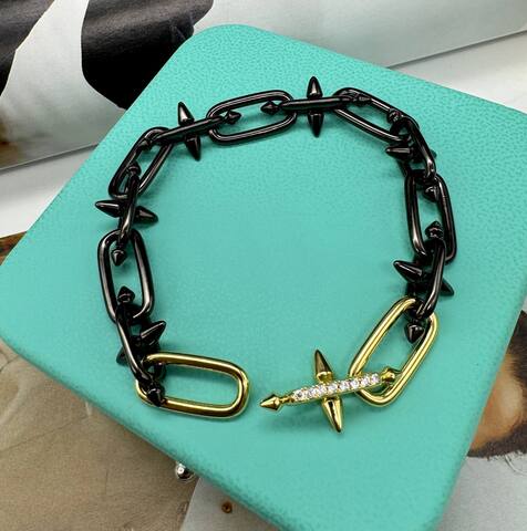 53242- Браслет lux из двухцветного металла черный/золото с шипами в стиле Тиффани/FARRELL WILLIAMS