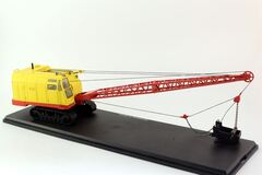 Excavator E-10011 yellow-red 1:43 ModelPro