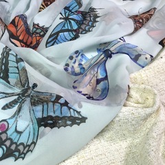 Ткань  шелк  шифон голубой с бабочками большими 1127