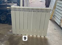 Биметаллический радиатор Б/У 500 9 секц. бок.