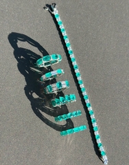 31946- Кольцо-дорожка из серебра с багетными цирконами цвет параиба