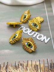 Пуговицы Скиапар. матовое золото в форме глаза с ресничками