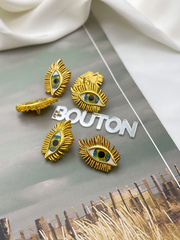 Пуговицы Скиапар. матовое золото в форме глаза с ресничками