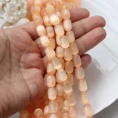 Селенит бусины, бочонок, персиковый, 12*9 мм, 1 нить, К015
