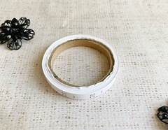 Размерники полиэстер 32, 10х25мм в рулоне 300 шт (+/-30шт).