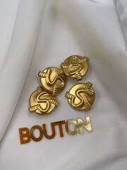 Пуговицы Скиапар. золотистые змейка 