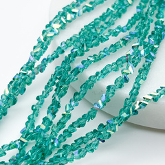 Бусина Треугольник, стекло, цвет изумруд АВ, размер около 2,5*3,5 мм, цена за нить 32 см