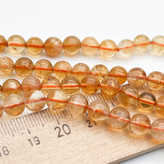 "Цитрин" бусины (кварц), диаметр около 6,5-6,8 мм, цена за 14-15 шт (1/4 нити)