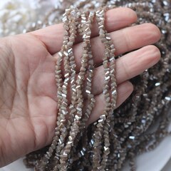 Хрусталь (стекло) граненный, тёплый тауп 4*3 мм, 1 нить, С017