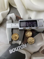 Пуговицы золотистые плетеные косичкой