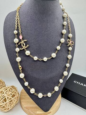 56175 - Колье CHANEL с жемчугом и бантом