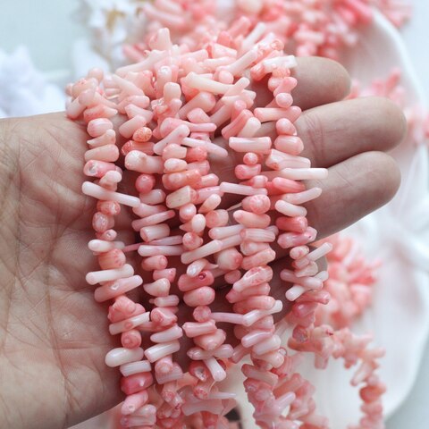 Коралл розовый (имитация), бусины 3x5-6x10 мм, 1/2 нити, К029