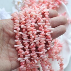 Коралл розовый (имитация), бусины 3x5-6x10 мм, 1/2 нити, К029