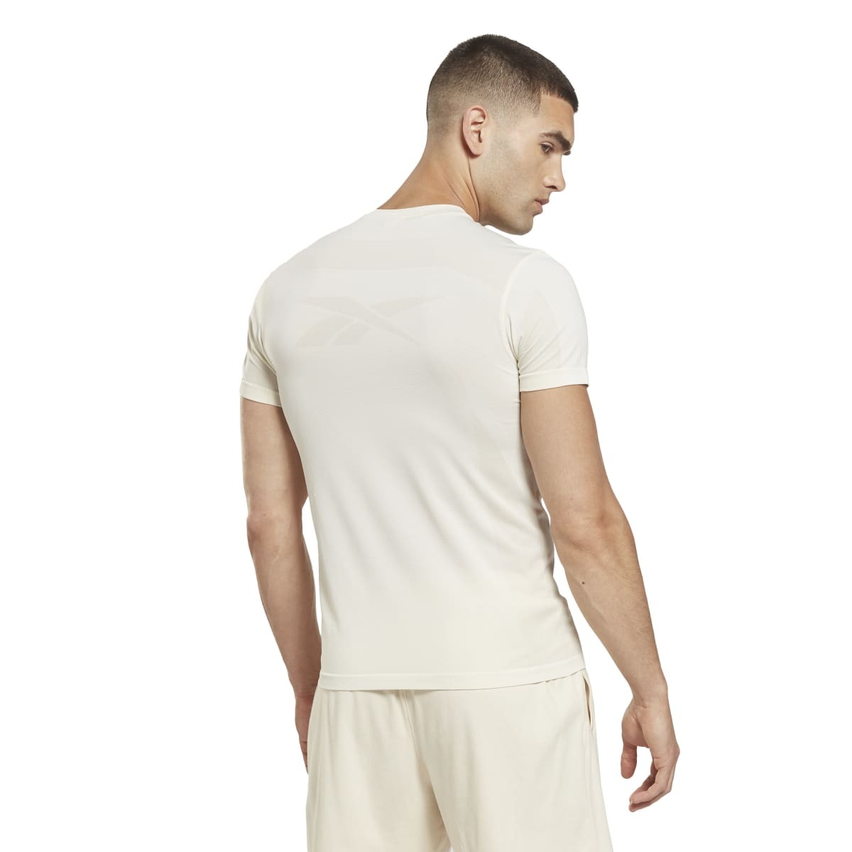 Мужская теннисная футболка Reebok Les Mills Myoknit Tee - classic white -  купить по выгодной цене
