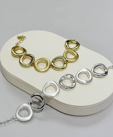 braslet-s-ovalnymi-motivami-matovo-zoloto-serebro