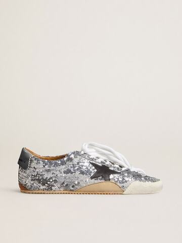True Star in silver sequins with black star and beige leather heel tab