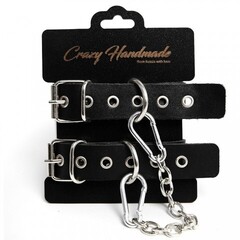 Наручники однослойные, прямоугольной формы, чёрного цвета