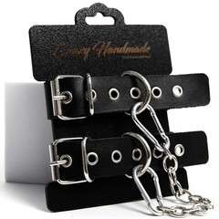 Наручники однослойные, прямоугольной формы, чёрного цвета