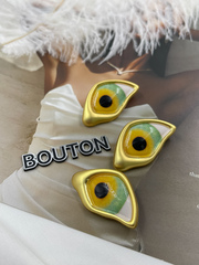 Пуговицы золотистые Скиап. "Большой зеленый глаз"