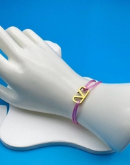 58214 - Браслет VALENTINO с подвеской логотипом на красной нити