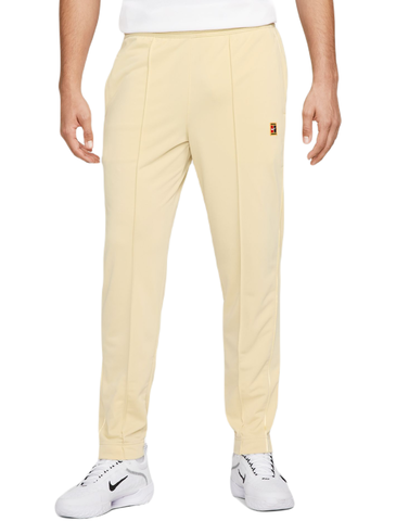 Теннисные брюки Nike Court Heritage Suit Pant - team gold