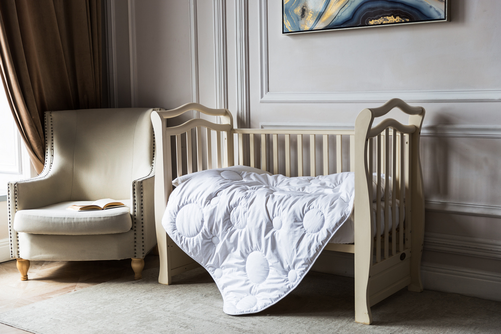 Размер детского одеяла в кроватку – на что следует обратить внимание