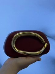 Сумка клатч с оригинальной ручкой