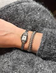 Браслет CLASH с шипами в стилистике CARTIER