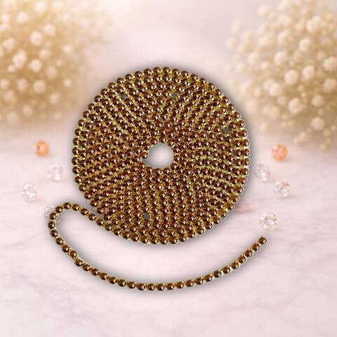 стразовая лента с коричневой жемчуженой на золотом метале,1метр