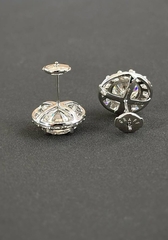 Серьги- пусеты круглые из серебра 925 пробы с муассанитами