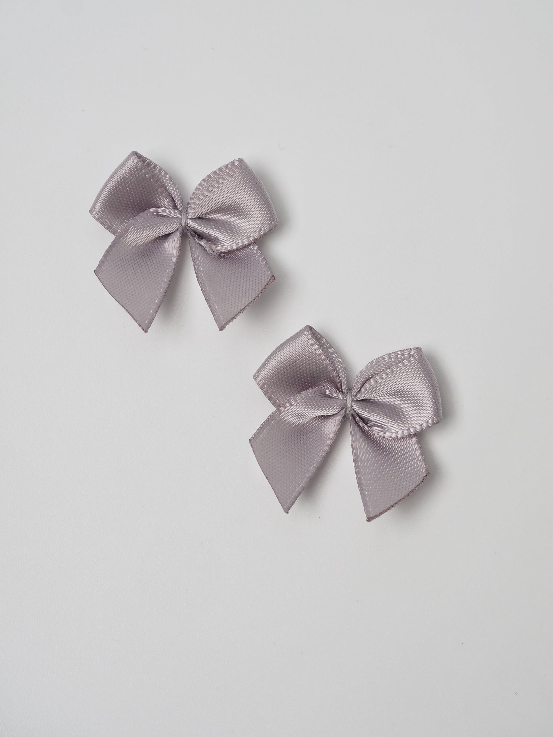 Бантик пришивной серый 2,5 см