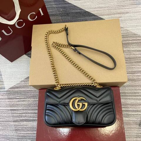 Стеганая мини-сумка Gucci GG Marmont черный