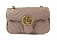 Стеганая мини-сумка Gucci GG Marmont бежевый