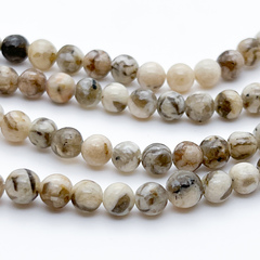 Пегматит бусины, диаметр 6-6,5 мм, цена за 28-29 шт (1/2 нити)