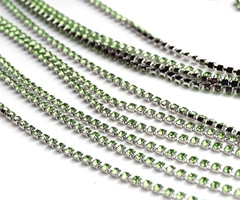 Стразовая цепочка 2 мм светло-зеленый прозрачный, родий