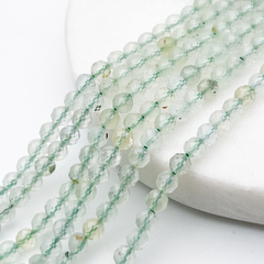 Пренит граненый бусины, диаметр около 4 мм, цена за отрезок 19 см (1/2 нити)