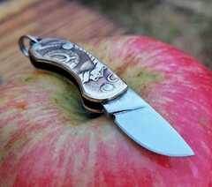 Coin folding knife