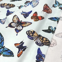 Ткань хлопок сатин с эластаном  голубой  с бабочками 2108