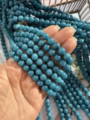 Нить бусин из тонированного кварца 8,4мм, гладкие