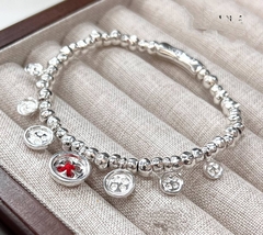 68128- Браслет UNOde 50 с подвесками