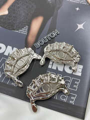 Пуговицы серебристые Скиапар. 