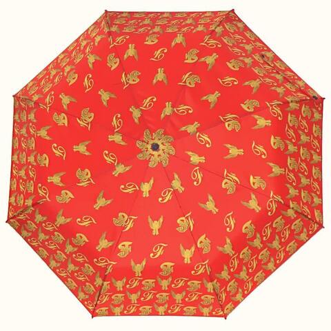 Дорогой женский зонтик с золотыми символами на красном фоне