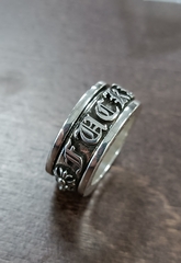 Кольцо FACK с крутящейся серединой (спинер) из серебра, в стилистике CHROME HEARTS